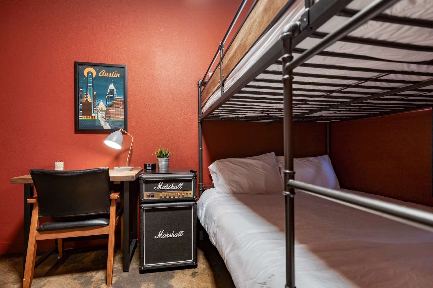 Headboard area with reading lamp and power outlet