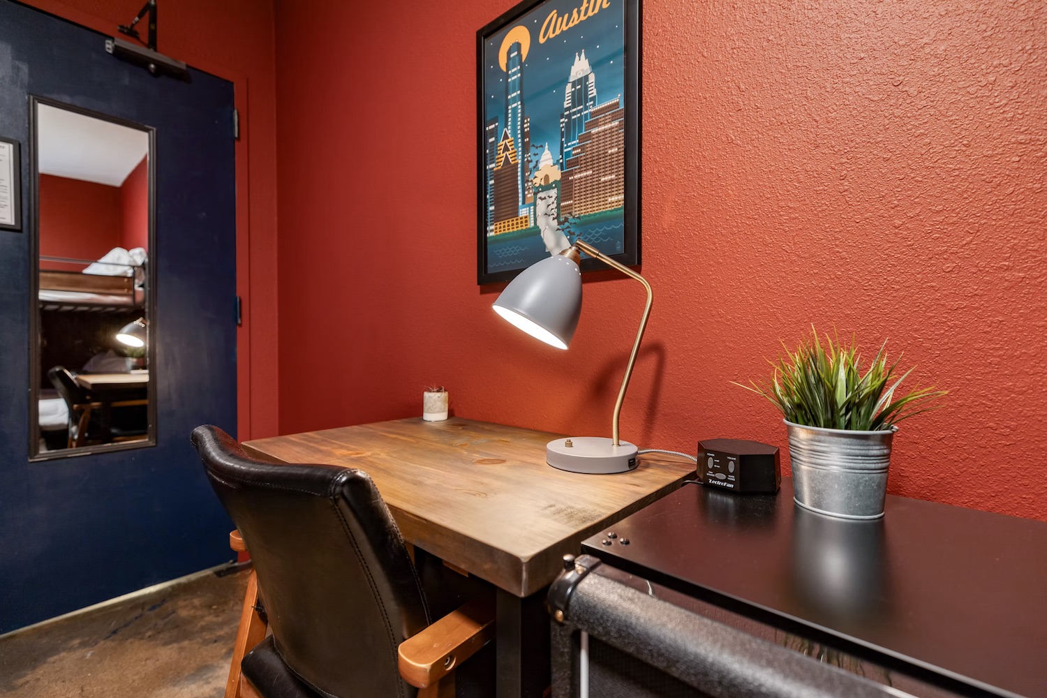 Room corner showing air conditioning and furnishings