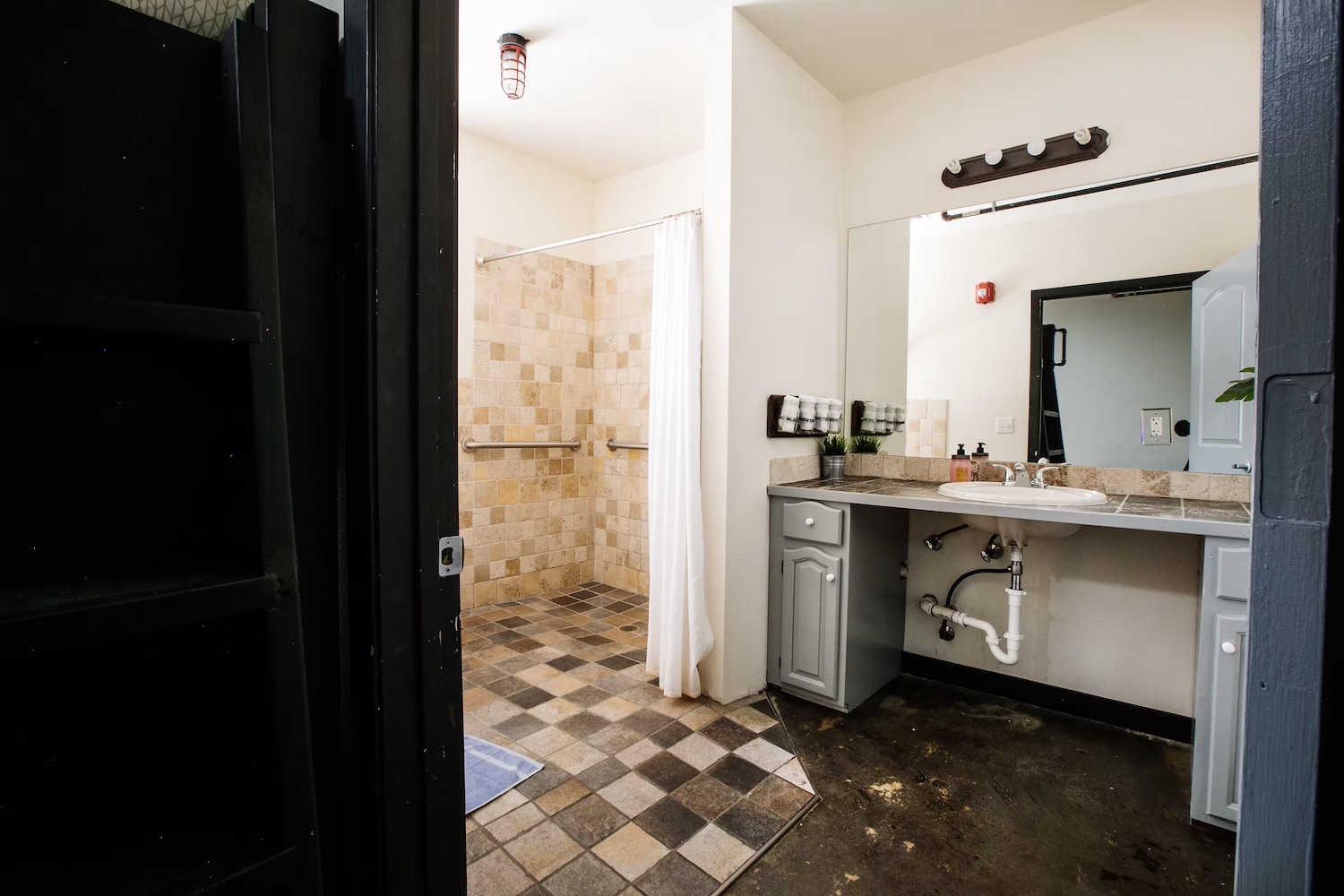 Suite living area with seating and decorative accents